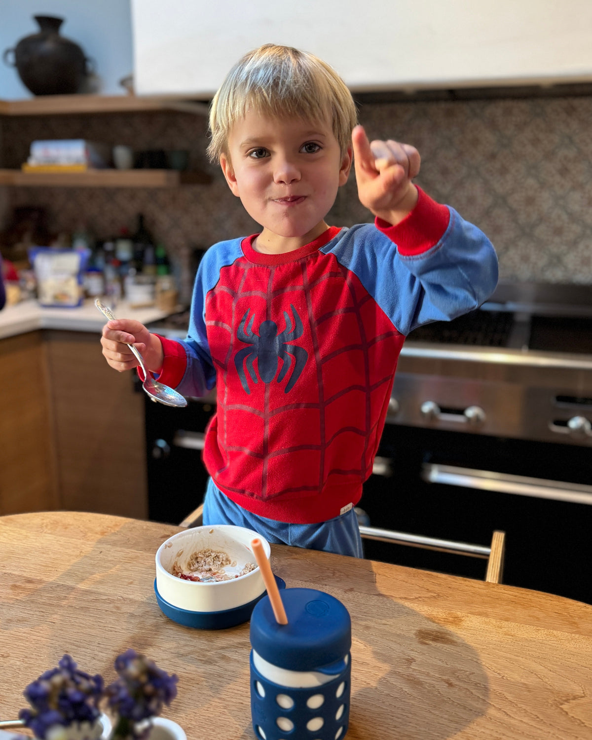 Boy using Childish bowl and cup