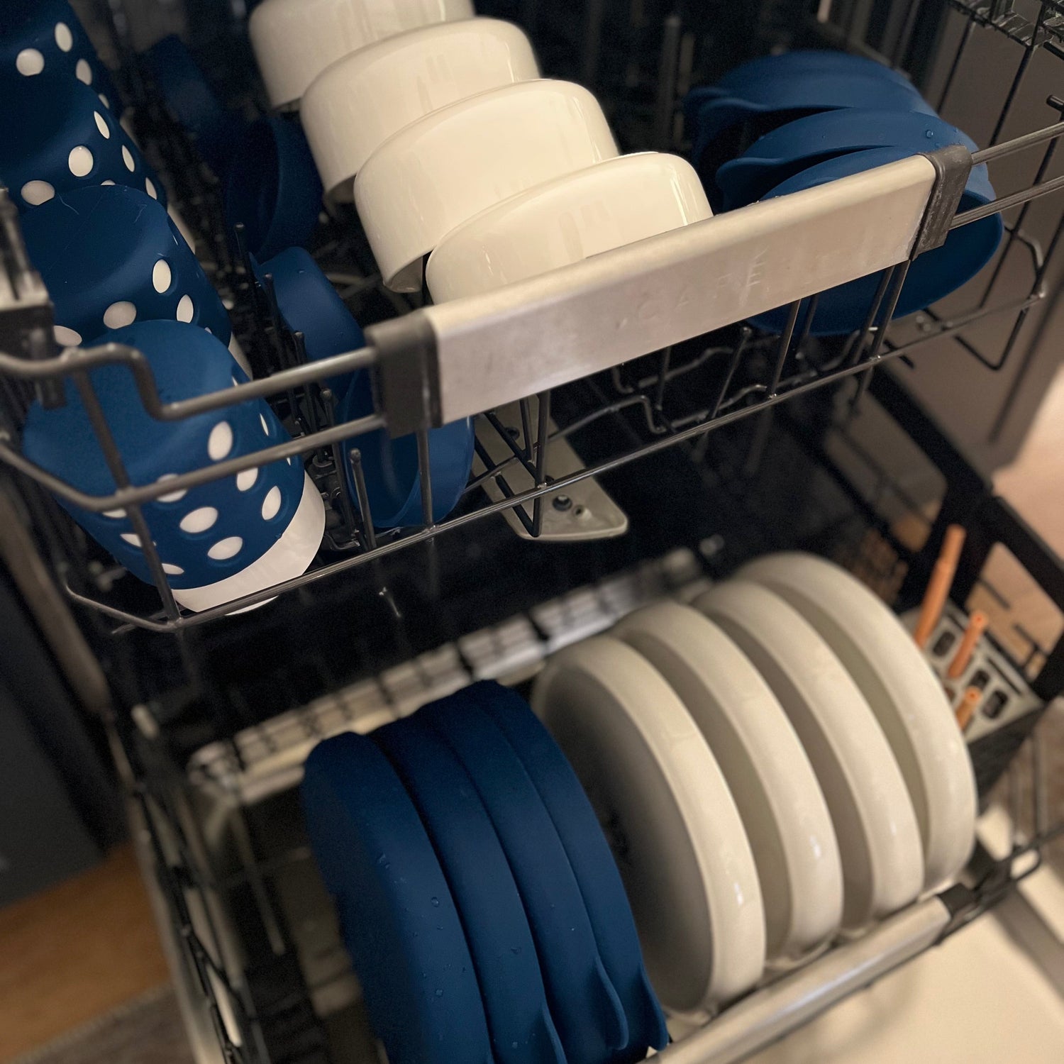 Dishwasher with blue and white dishes in a kitchen setting